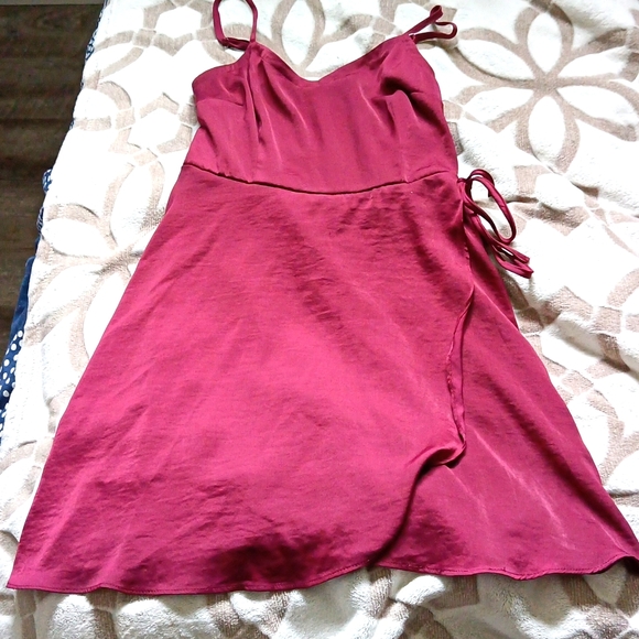 A dress with a stretchy back. It's maroon. - Picture 1 of 1